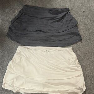 Bumdle of two Athleta 1) Navy and 2) White Tennis Skorts